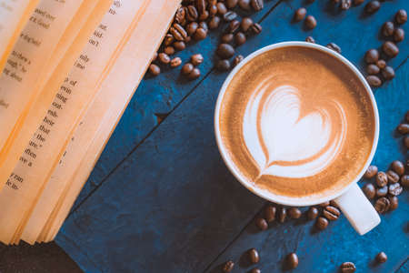 coffee latte art on wood table, relax time, cafe barista art top view.の写真素材