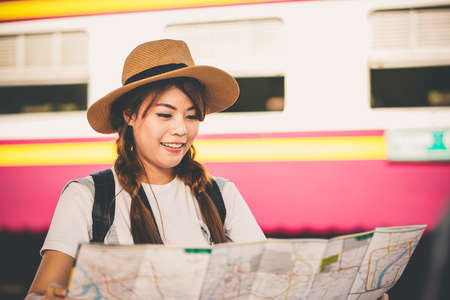 asian woman traveler tourists travel city street, journey backpack adventure outdoor by train.