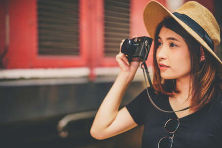Happy shopper asian woman holding credit card online shoppingの写真素材