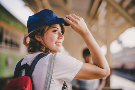 asian woman traveler tourists travel city street, journey backpack adventure outdoor by train.の写真素材