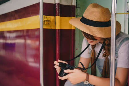 asian woman traveler tourists travel city street, journey backpack adventure outdoor by train.の写真素材