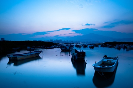 Last sunrise and fishing sub-dug with flash, the new Taipei, Taiwan の写真素材