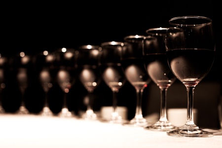 glass of red and white wine at a restaurant の写真素材