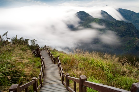 Sunshine with mountain , cloud and fog in the morning