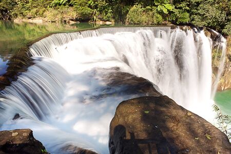 Shifen waterfall is located at Pingxi township in Taipei, Taiwan の写真素材