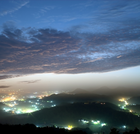 mountain valley with beautiful cloud in the sky at dawn の写真素材
