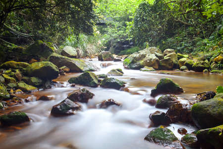 Fast flowing water in the mountain river for adv or others purpose useの写真素材