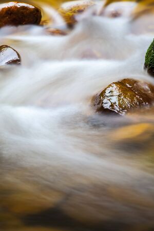 Fast flowing water in the mountain river for adv or others purpose use