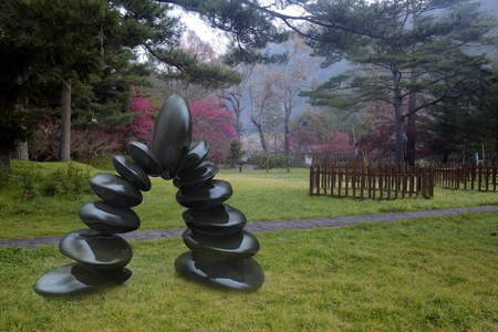 sculpture and foliage backgroundのeditorial素材