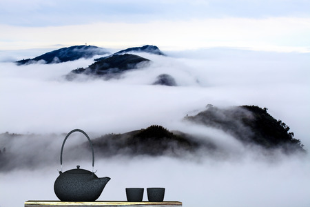 Black teapot with nice backgroundの写真素材