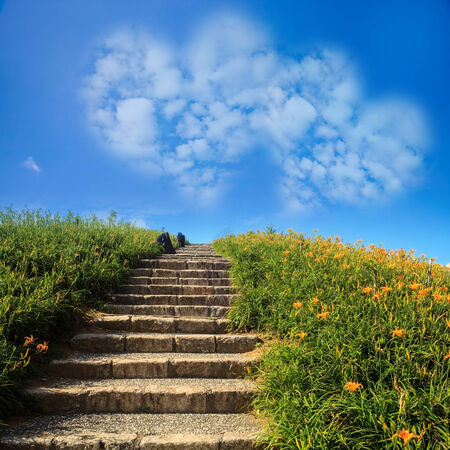 Picture of a a heart cloud on blue sky for adv or others purpose useの写真素材