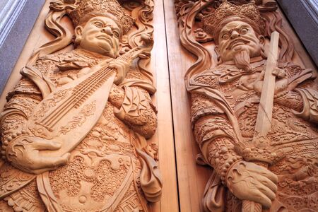 Wood carving Buddhist temple door public places of Buddhist worship