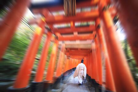 Red Tori Gate at Fushimi Inari Shrine in Kyoto, Japan, selective focus, soft focus and blur imagのeditorial素材
