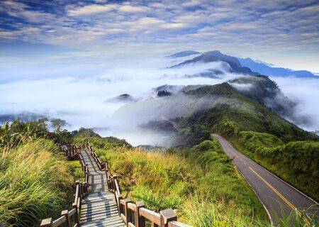 The imageing of beautiful landscapes with green road and nice backgroundの写真素材