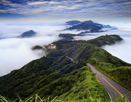 The imageing of beautiful landscapes with green road and nice backgroundの写真素材