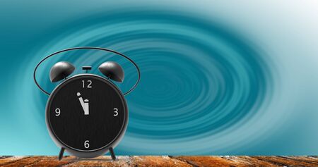 The alarm clock with little minutes to twelve o'clock