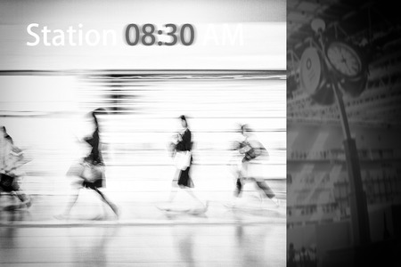 The blurred image of asian people in the station  rush time for train subway stationの写真素材