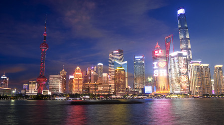 Shanghai, China - Ooc 11 , 2018 : night view of the modern Pudong skyline across the Bund in...
