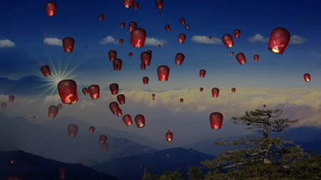 The fire paper lanterns in the night sky with nice background