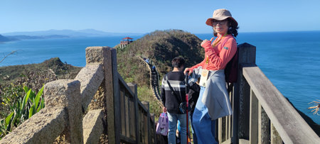 Bitoujiao Trail, New Taipei City - 2024/12/01: Binhai Line, Lighthouse Line and Ridge Valley Line are an intellectual hiking route, Bitoujiao Trail, New Taipei Cityの写真素材