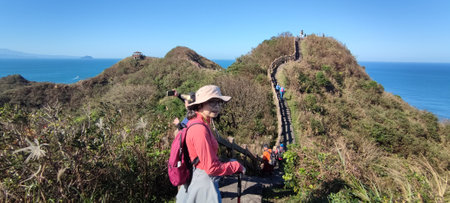 Bitoujiao Trail, New Taipei City - 2024/12/01: Binhai Line, Lighthouse Line and Ridge Valley Line are an intellectual hiking route, Bitoujiao Trail, New Taipei Cityの写真素材