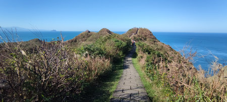 Bitoujiao Trail, New Taipei City - 2024/12/01: Binhai Line, Lighthouse Line and Ridge Valley Line are an intellectual hiking route, Bitoujiao Trail, New Taipei Cityの写真素材