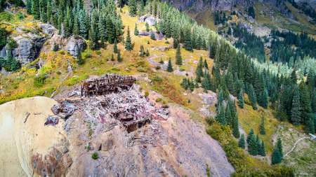 Mill for mining abandoned and falling apart in mountainsideの写真素材