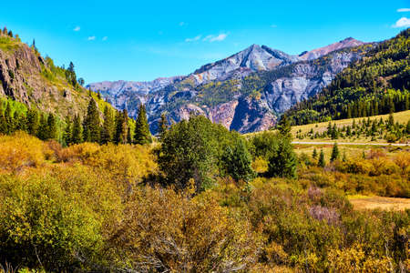 Beautiful mountain valley landscape with grey mountain peaksの写真素材