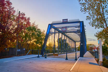 Sunset view of metal walking bridgeの写真素材