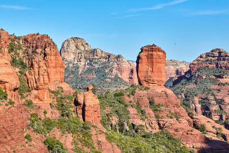 Aerial of large red rock in mountainsの写真素材
