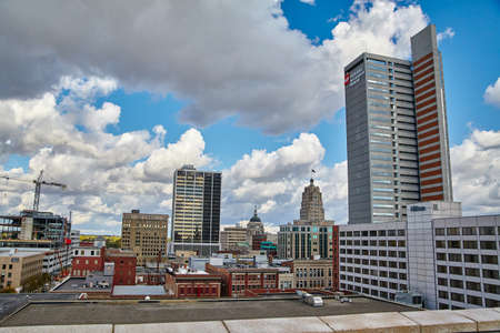 Picture of a downtown city with skyscrapers and industrial buildingsの写真素材