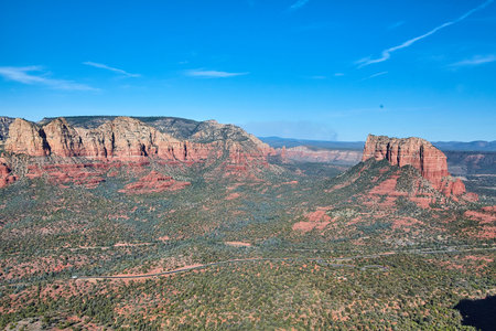 Aerial of desert landscape with large red rock mountainsの写真素材