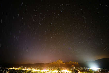 Blur of circular stars at night in Sedona Arizona landscapeの写真素材