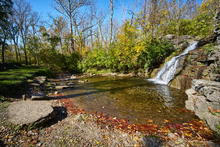 Waterfall in nature with small pondの写真素材