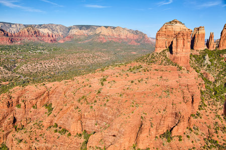 Aerial close up of large red rock mountain in the desertの写真素材