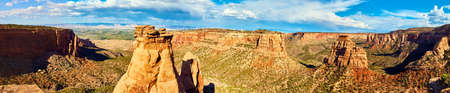 Panorama of large canyon with rocky pillars in desertの写真素材