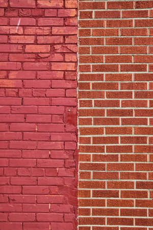 Vertical brick wall divided by two types of brickの写真素材