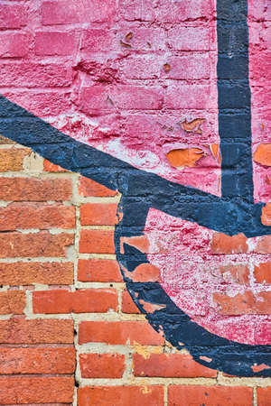 Texture of red bricks with black and red paintの写真素材