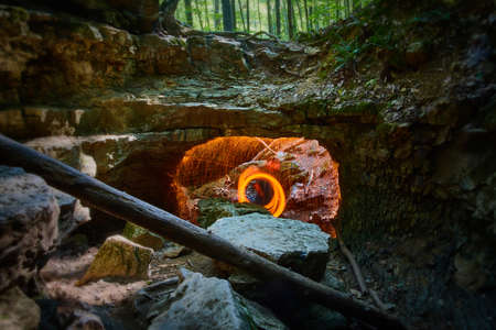 Portal of orange spherical sparks in a small canyonの写真素材