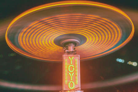 Cosmic YOYO carnival or fair ride at night in infraredの写真素材