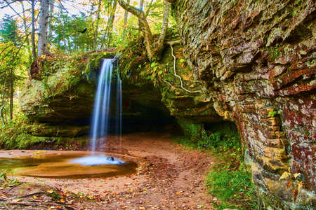 Gentle Scott Falls waterfall dips into a small circular water basinの写真素材
