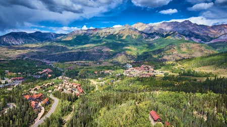 Tourist ski town in the mountains with fall aspen treesの写真素材