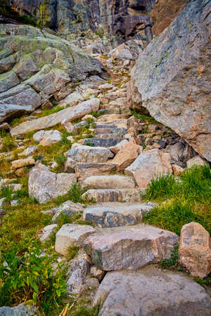 Stone steps walking hiking path up mountainの写真素材