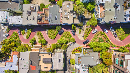 San Francisco view from above of Lombard Street winding brick roadの写真素材