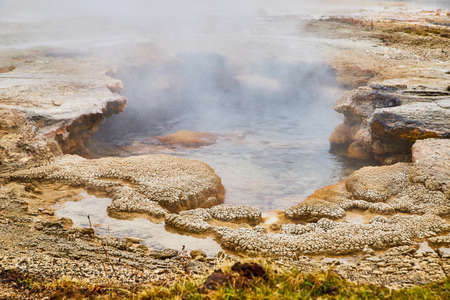 Steamy pool at Yellowstone in springの写真素材