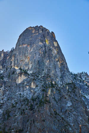 Yosemite large rocky cliffs of Cathedral Rock during sunriseの写真素材