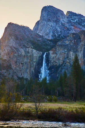 Yosemite stunning Bridalveil Falls at sunrise with layers of colorの写真素材