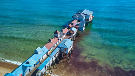 Shops cover large pier on ocean coast of Maineの写真素材