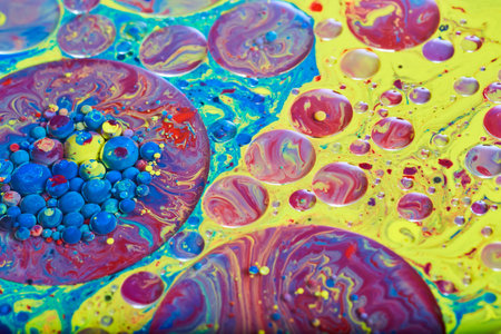 Abstract petri dishes of vibrant popping sphere bubbles colorful cosmic swirling background assetの写真素材