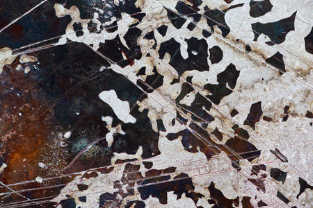 Textured background asset burned hard drive CD disk with scratches and white patchesの写真素材